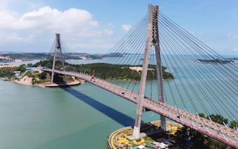 Barelang Bridge spanning over water in Batam, Indonesia, part of Harmoni One Batam 2 Days and 1 Night Package.