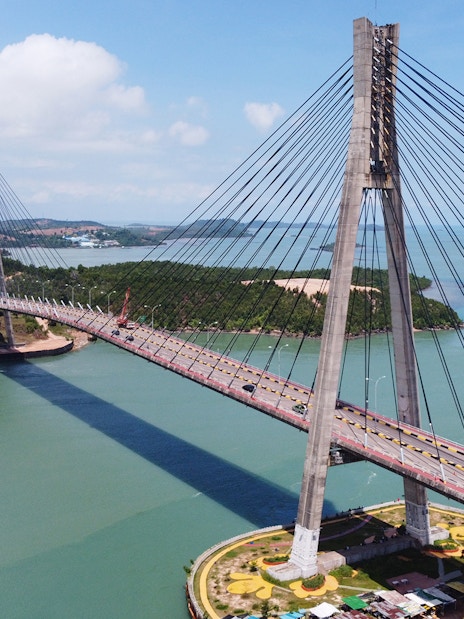 Barelang Bridge spanning over water in Batam, Indonesia, part of Harmoni One Batam 2 Days and 1 Night Package.