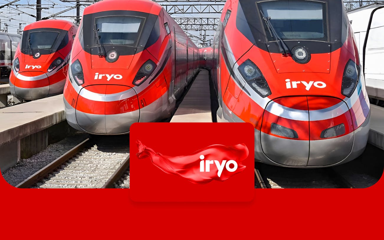 High-speed Iryo trains at a station for Madrid Atocha to Zaragoza Delicias route.