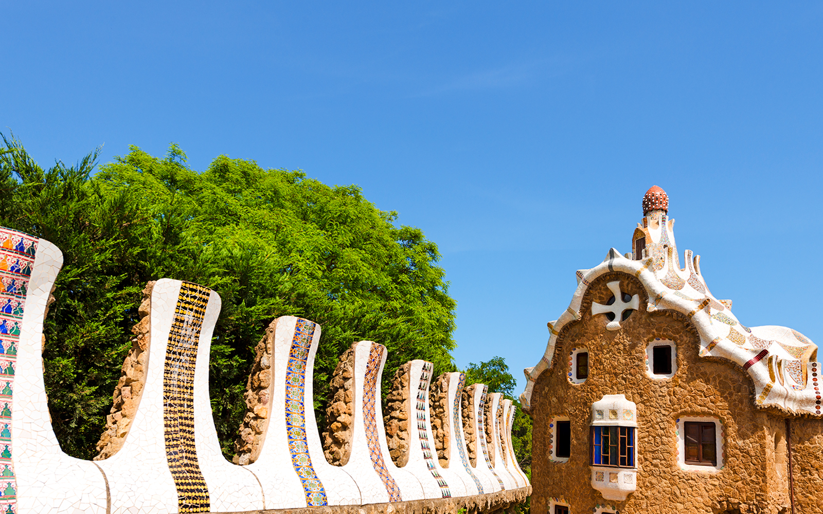 Casa del Guarda in Park Güell, Barcelona, featuring Gaudí's unique architectural style.