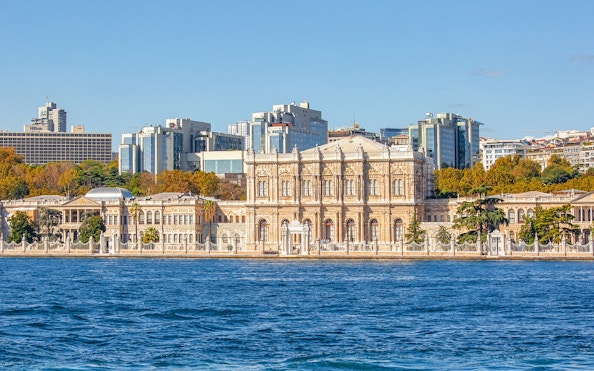 Dolmabahce Palace facade along the Bosphorus in Istanbul, Turkey.