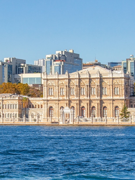 Dolmabahce Palace facade along the Bosphorus in Istanbul, Turkey.
