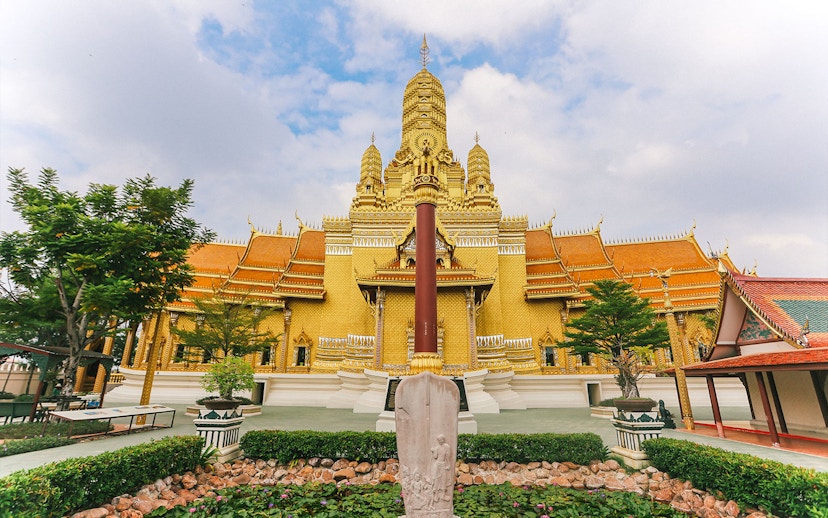 Golden temple facade at Ancient City, Thailand, featured on the Erawan Museum Guided Tour.