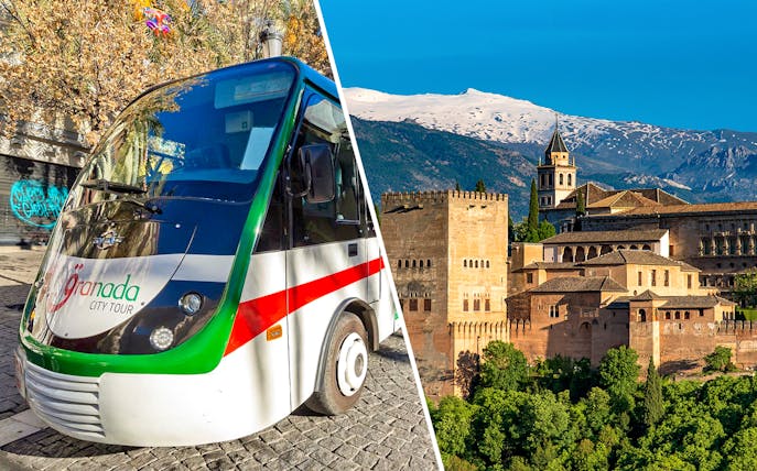 Granada city tour bus and Alhambra with Sierra Nevada backdrop.