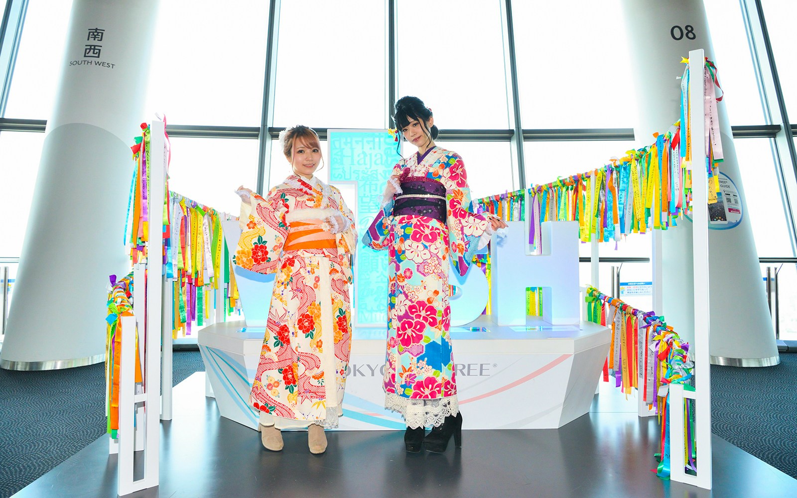 Visitors in traditional kimonos at Tokyo Skytree observation deck, Tokyo, Japan.