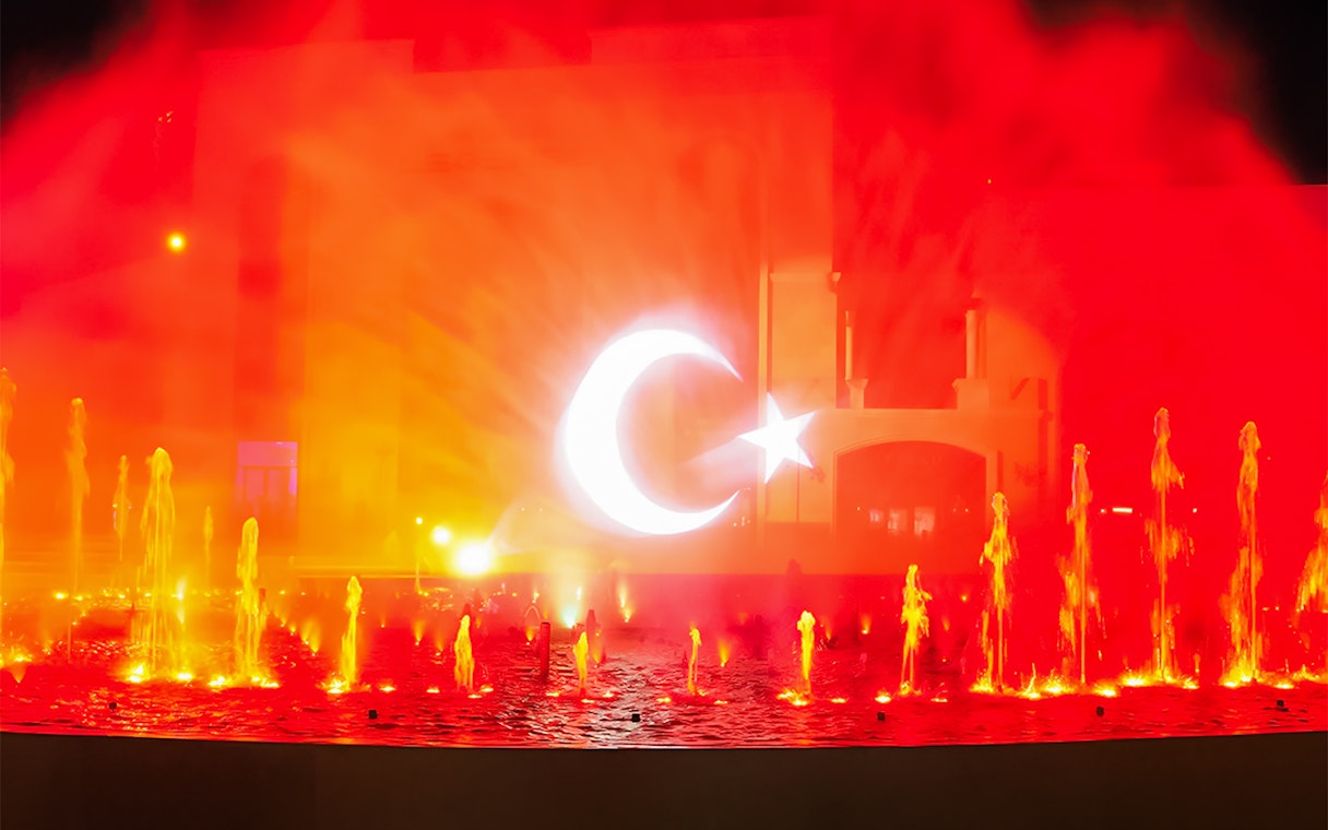 Chimera Fountain Show at Land of Legends, illuminated crescent and star, Turkey.