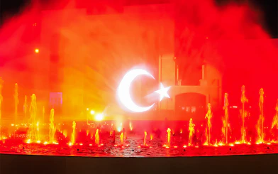 Chimera Fountain Show at Land of Legends, illuminated crescent and star, Turkey.