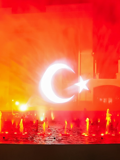 Chimera Fountain Show at Land of Legends, illuminated crescent and star, Turkey.