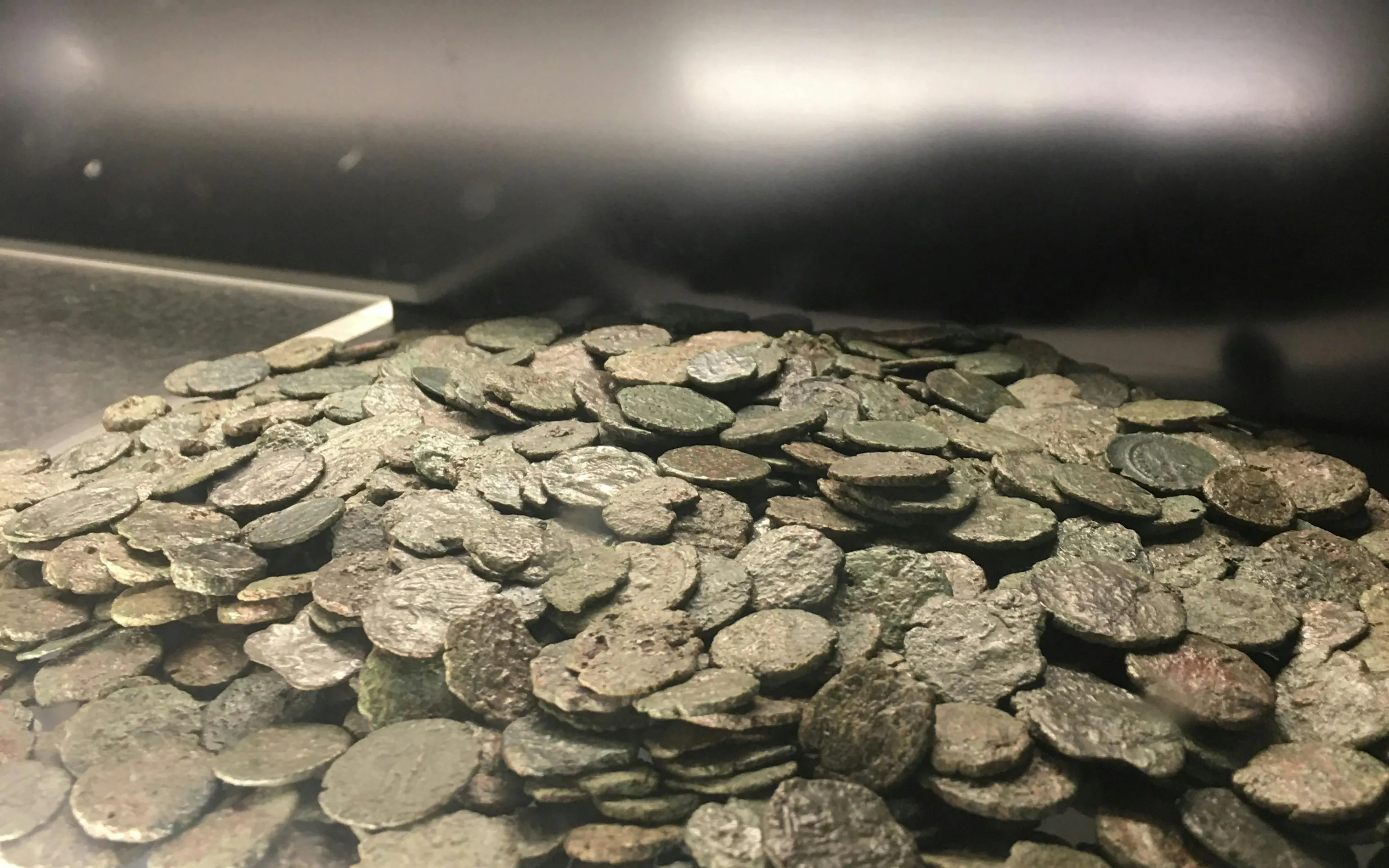 Ancient coins displayed in the Trevi District Underground tour, Rome.