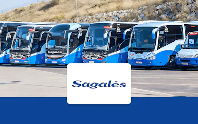 Buses at Girona Airport for transfer to Barcelona City Center.