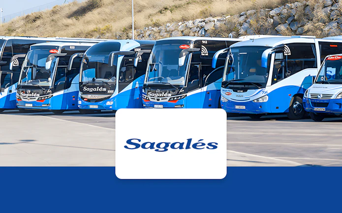 Buses at Girona Airport for transfer to Barcelona City Center.