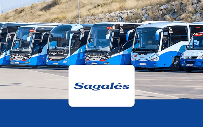Buses at Girona Airport for transfer to Barcelona City Center.