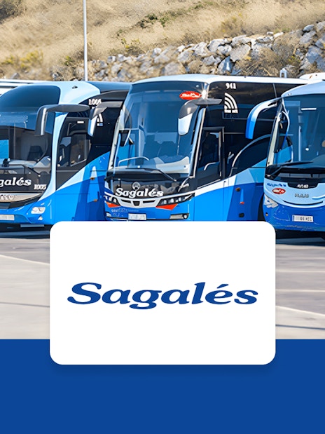 Buses at Girona Airport for transfer to Barcelona City Center.