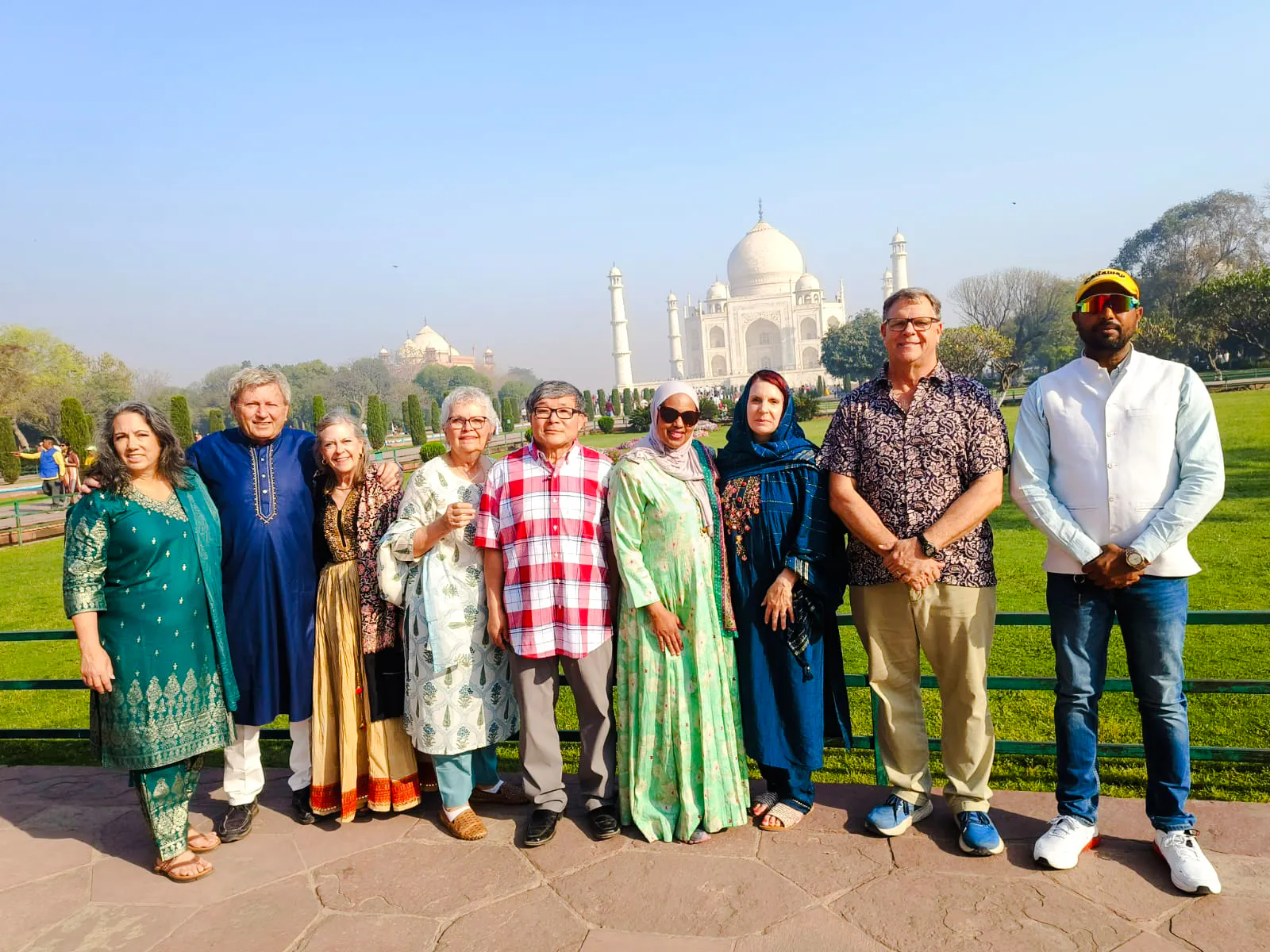 Tour group in front of the Taj Mahal, Agra, during a Delhi to Agra tour with lunch at Marriott.