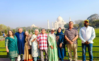 Tour group in front of the Taj Mahal, Agra, during a Delhi to Agra tour with lunch at Marriott.
