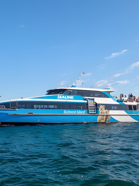 Ferry to Rottnest Island departing from Perth, with passengers on deck.