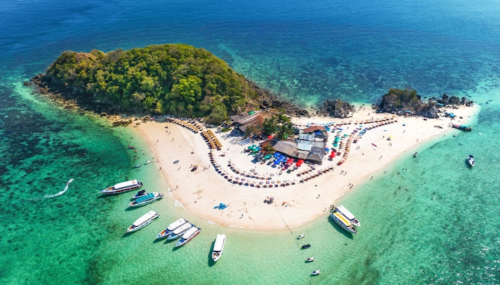 Aerial view of Khai Island's turquoise waters and sandy beaches, Phuket, Thailand.