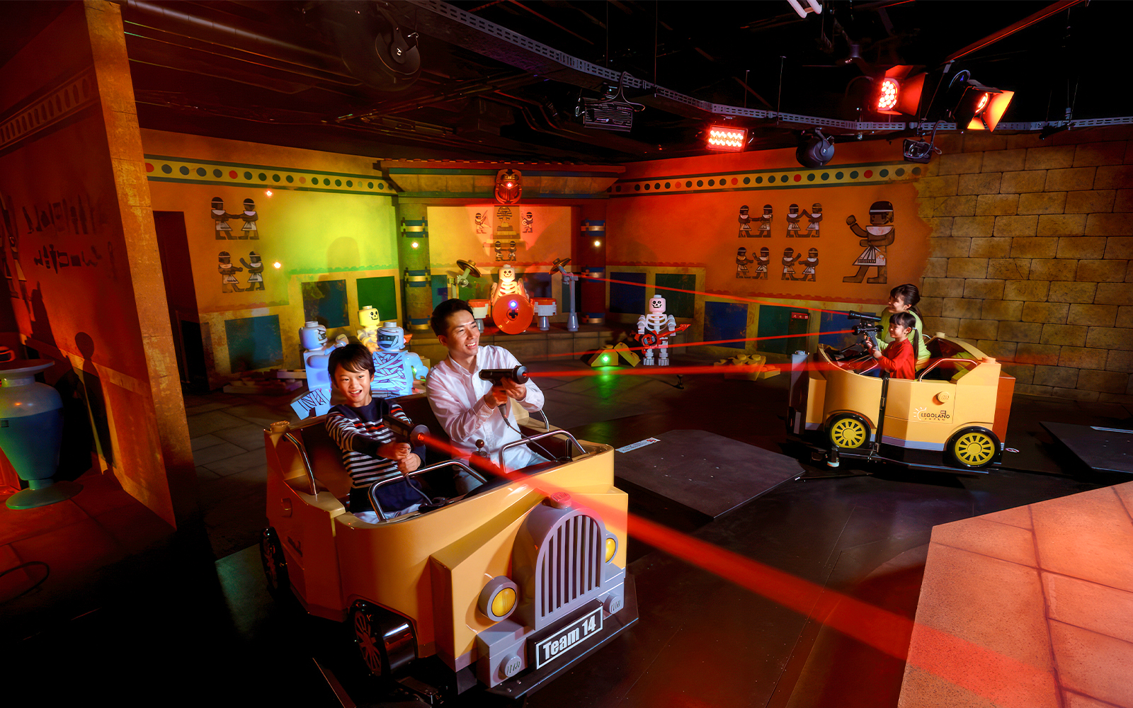 Visitors enjoying a laser ride at Legoland Japan.