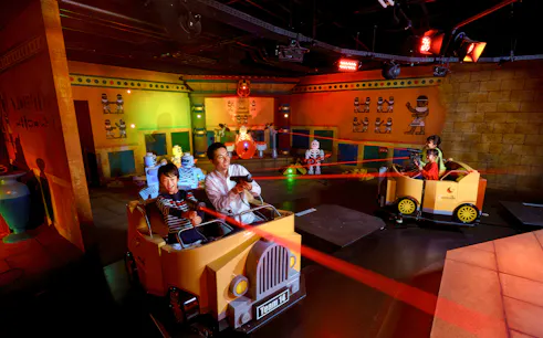 Visitors enjoying a laser ride at Legoland Japan.
