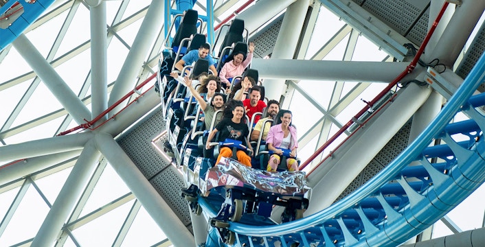 Riders enjoying The Storm Coaster in Dubai's indoor theme park.