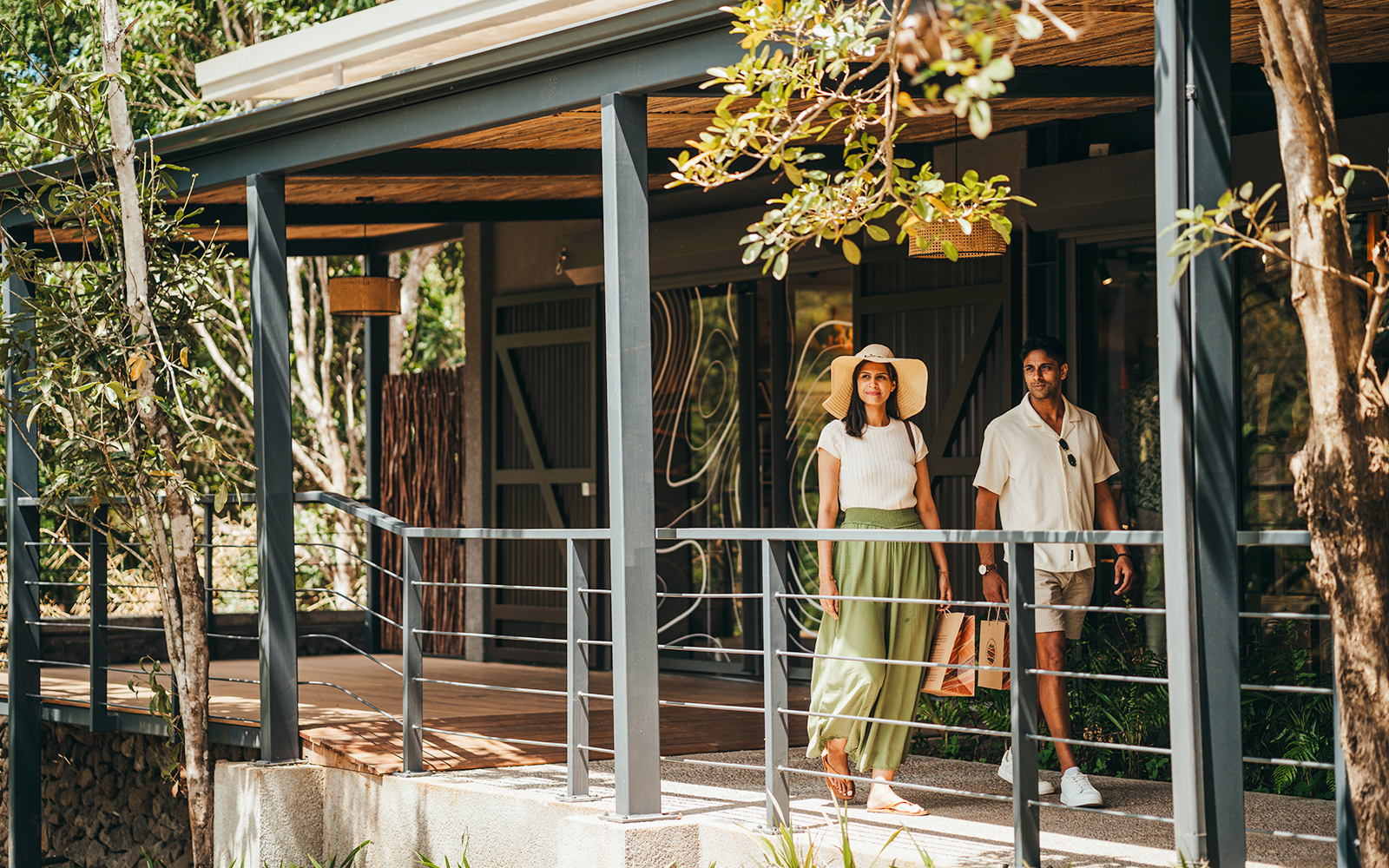 Visitors walking on Chamarel 7 Coloured Earth plantation tour in Mauritius.