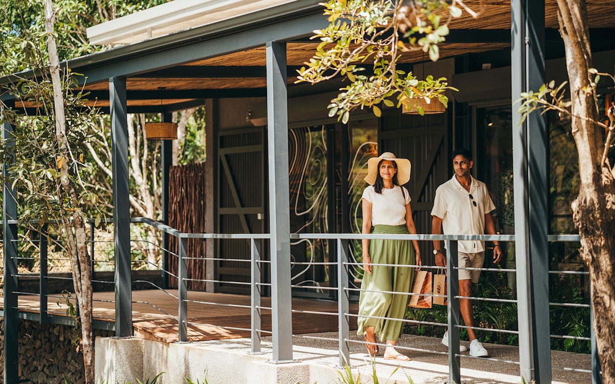 Visitors walking on Chamarel 7 Coloured Earth plantation tour in Mauritius.