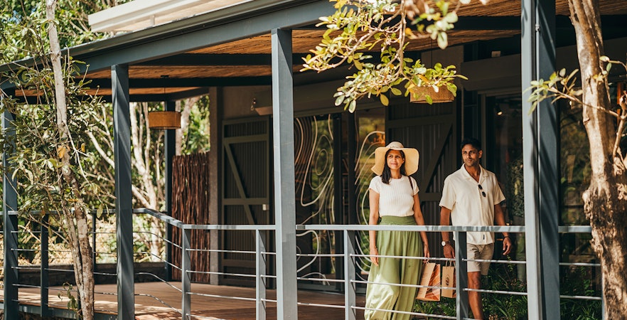 Visitors walking on Chamarel 7 Coloured Earth plantation tour in Mauritius.