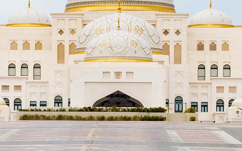 Qasr Al Watan palace in Abu Dhabi with ornate domes and intricate architecture.