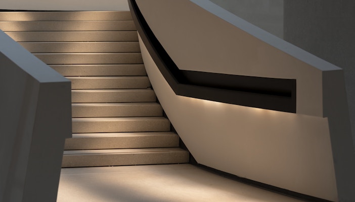 Staircase inside Zayed National Museum with modern design elements.