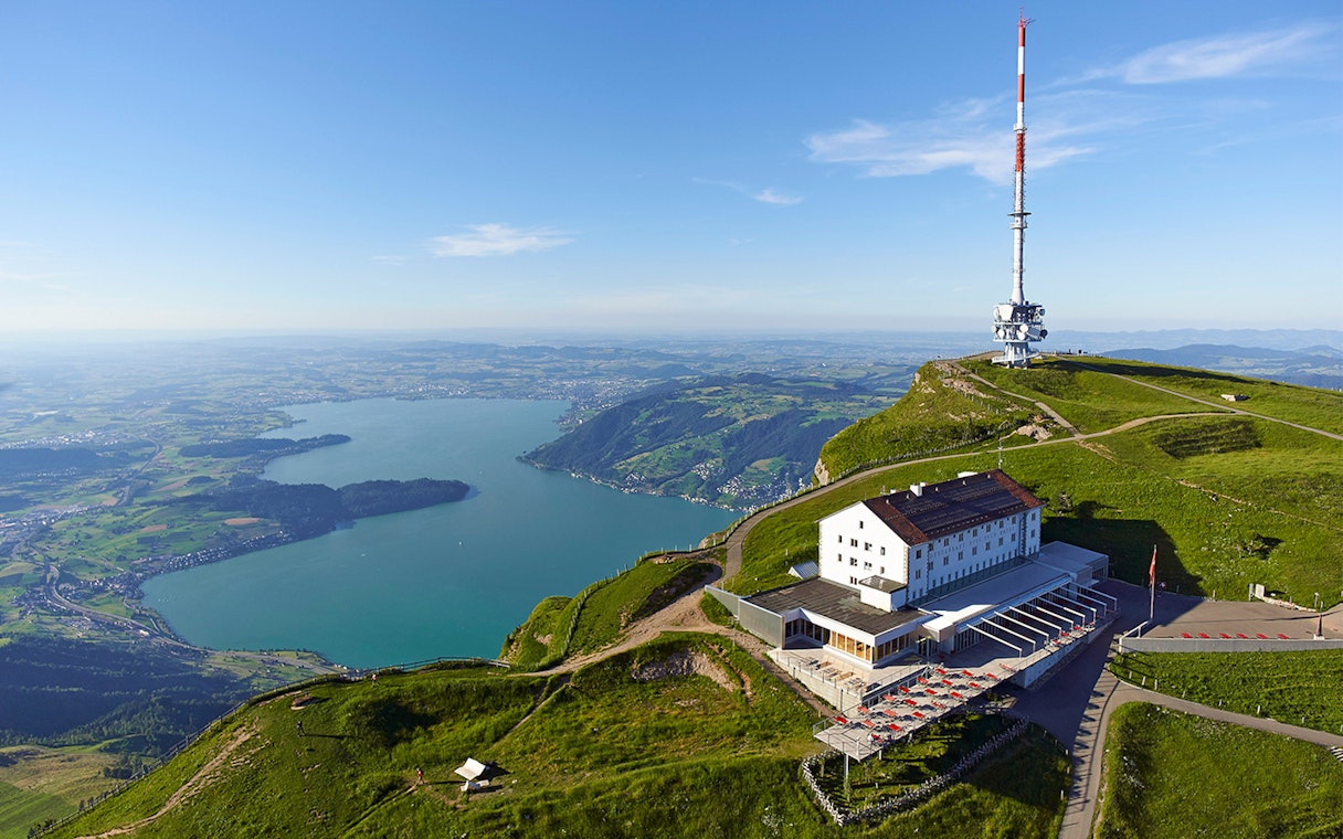 Mount Rigi summit with panoramic view of Lake Lucerne and surrounding landscape.