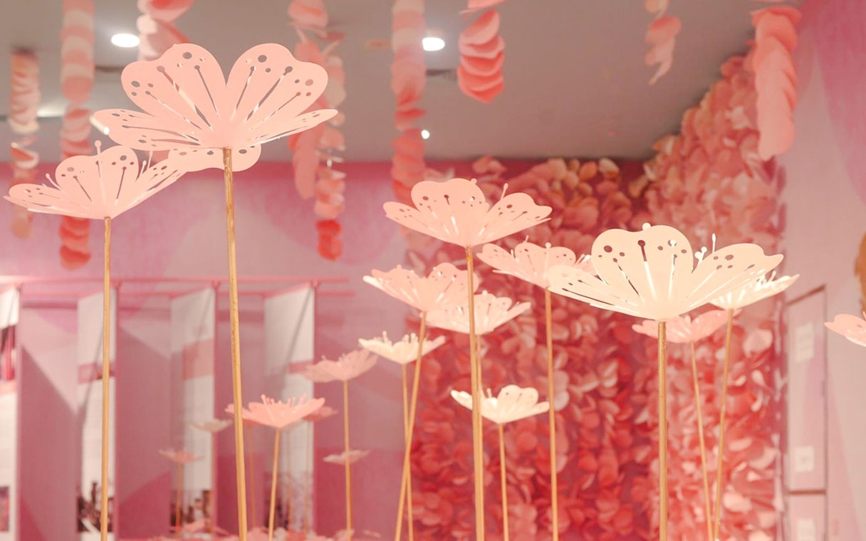 Pink paper flower art installation inside Shanghai Tower.