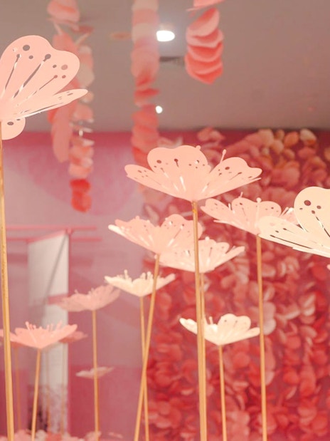 Pink paper flower art installation inside Shanghai Tower.