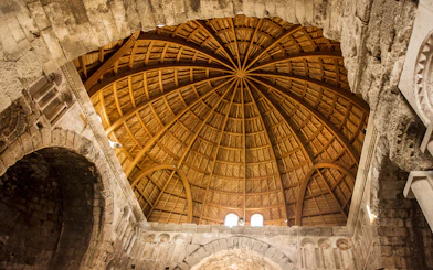 Wooden dome interior at Amman Citadel, Jordan.