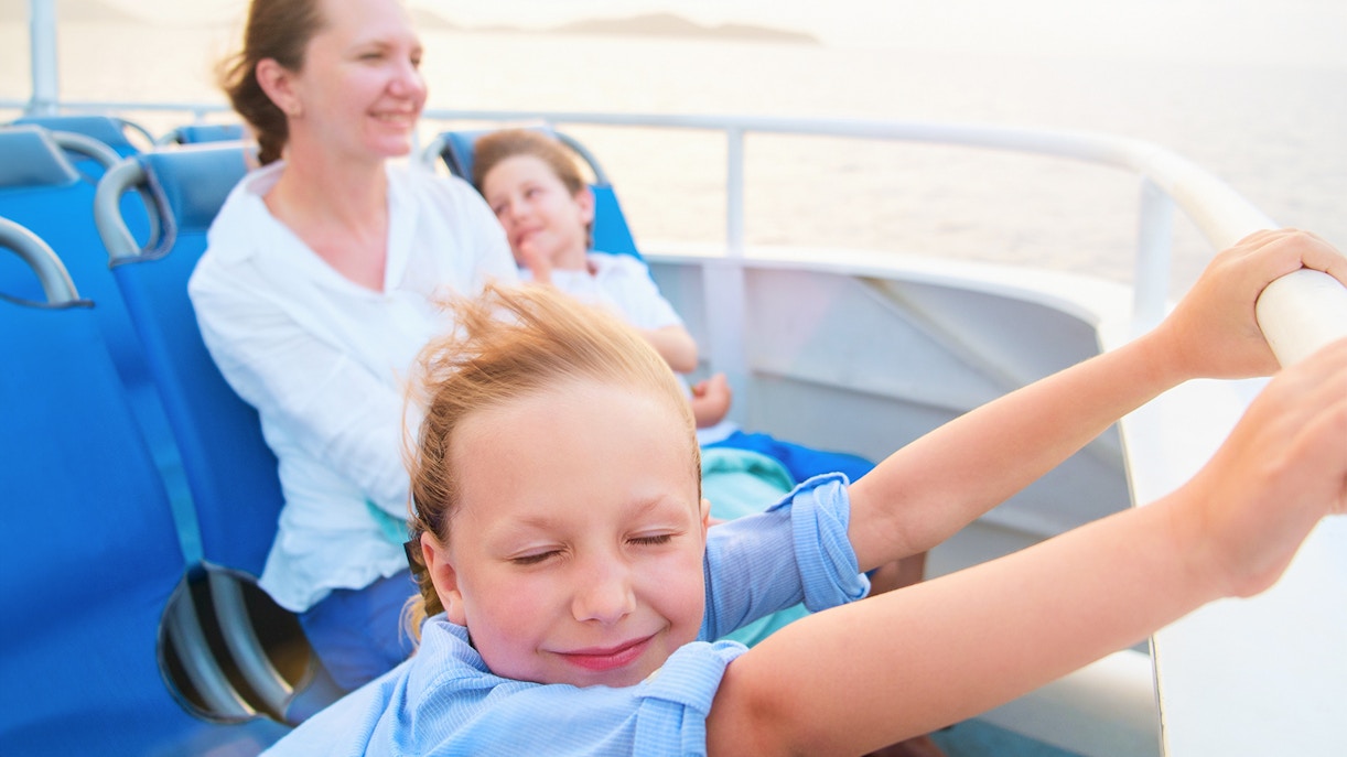 Family enjoying ride on ferry