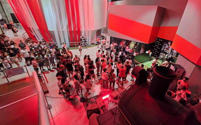 Visitors exploring exhibits at Museo River in Mâs Monumental stadium, Buenos Aires.