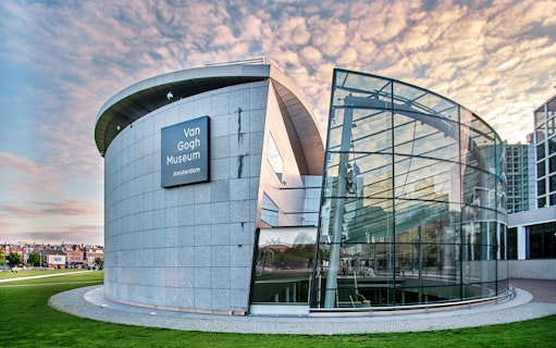 Van Gogh Museum exterior with modern glass facade in Amsterdam.