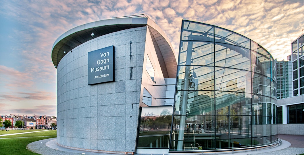Van Gogh Museum exterior with visitors in Amsterdam, Netherlands.