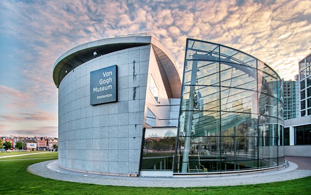 Van Gogh Museum exterior with modern glass facade in Amsterdam.