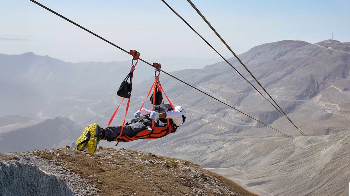 Jebel Jais zipline experience in Dubai with scenic mountain views.