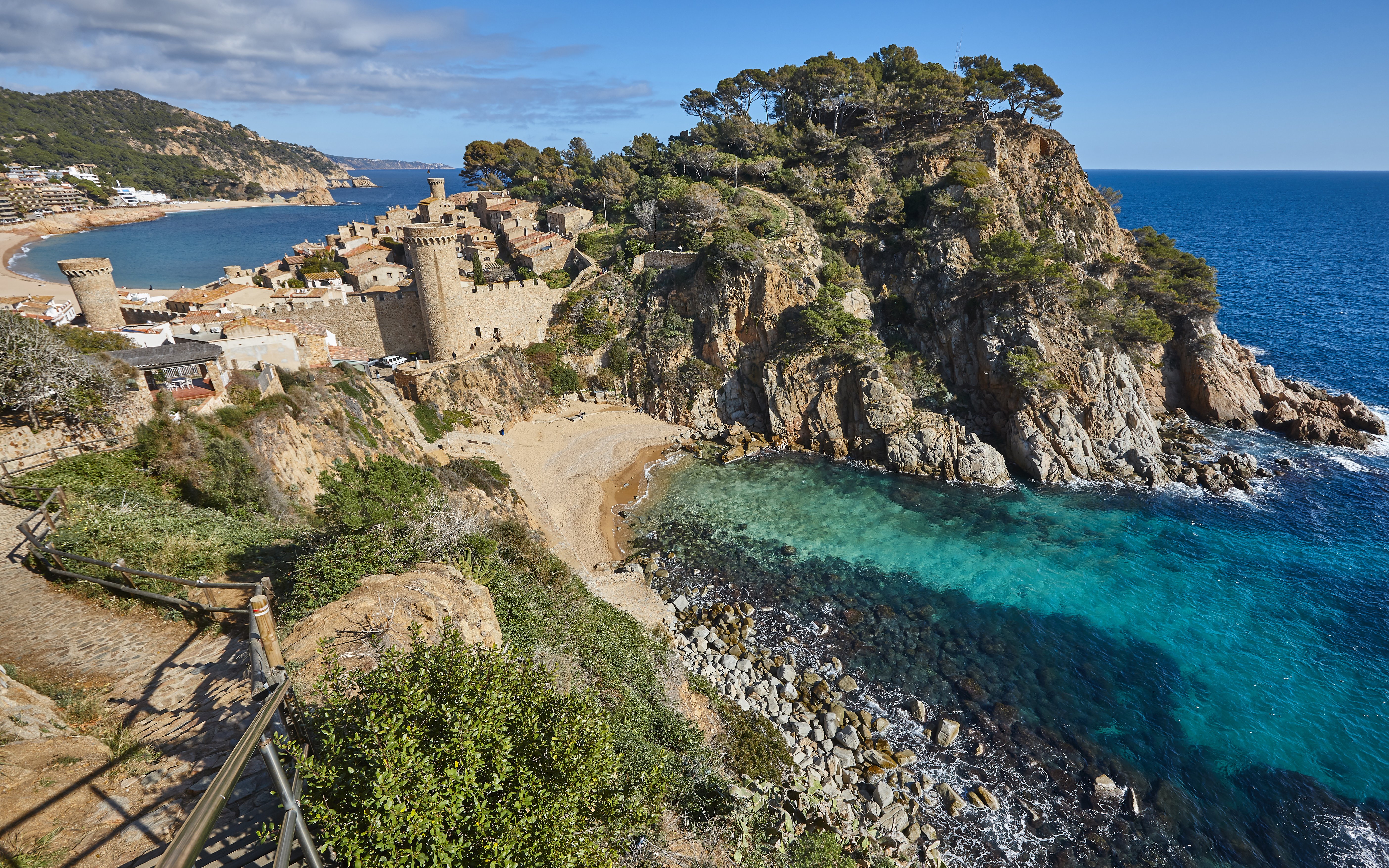 Medieval town of Tossa de Mar with castle walls and turquoise sea on Costa Brava, Catalonia, Spain.