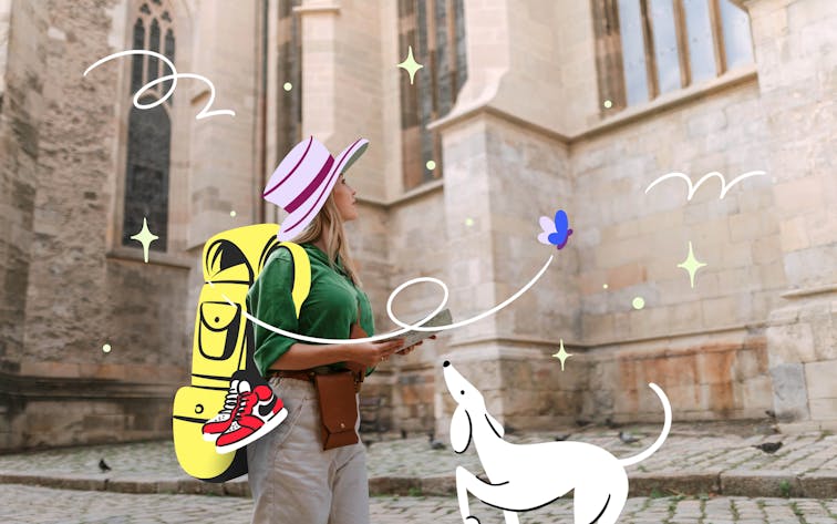 Solo traveler exploring historic European architecture with a map.