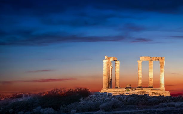 Temple of Poseidon at Cape Sounion during sunset, Athens, Greece.