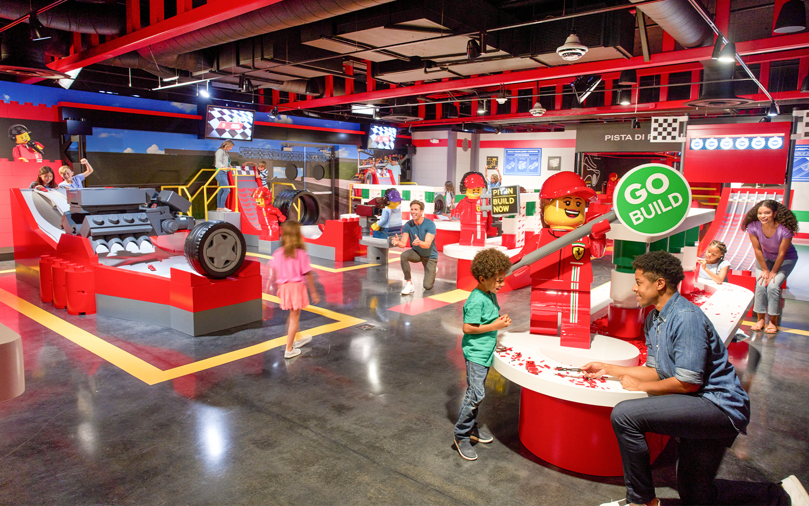 Children building LEGO cars at Ferrari Build and Race, LEGOLAND Florida.