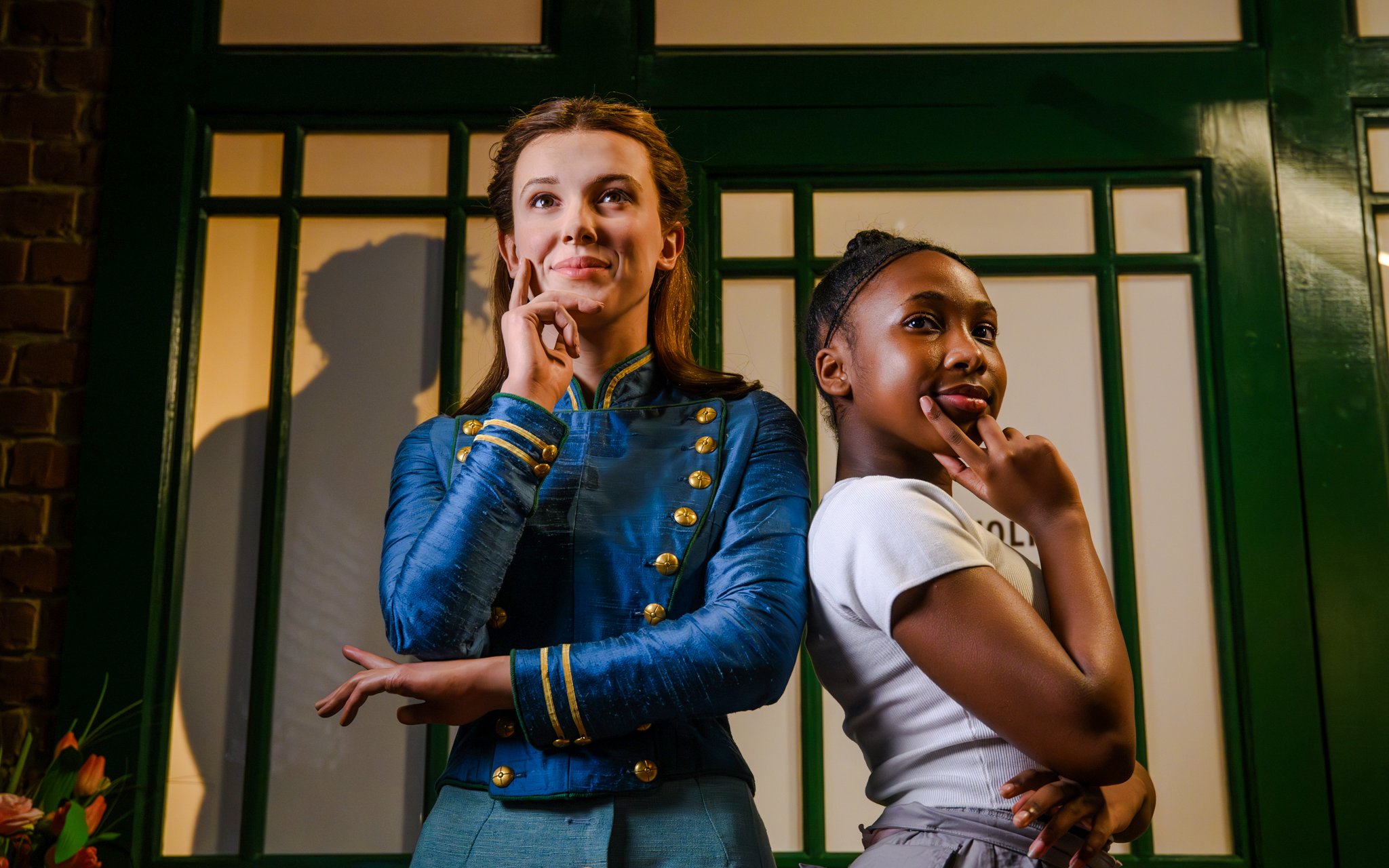 Wax figure and visitor posing at Madame Tussauds London Baker Street Studios.