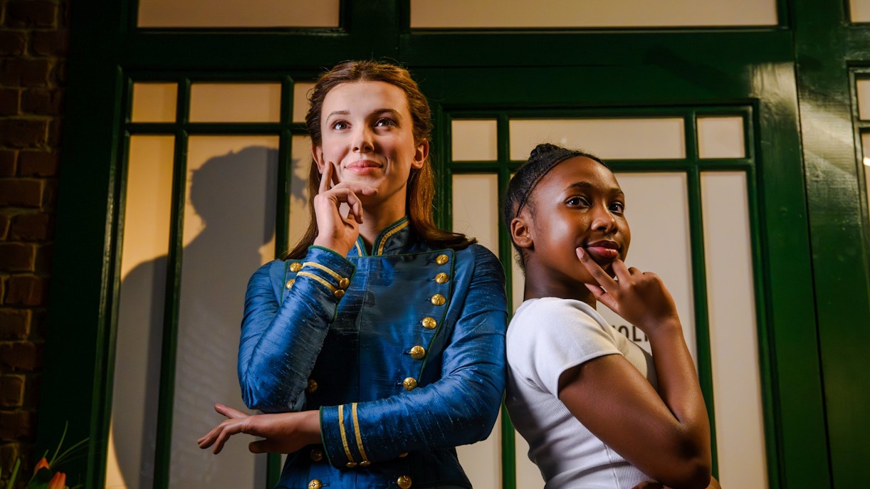 Wax figure and visitor posing at Madame Tussauds London Baker Street Studios.