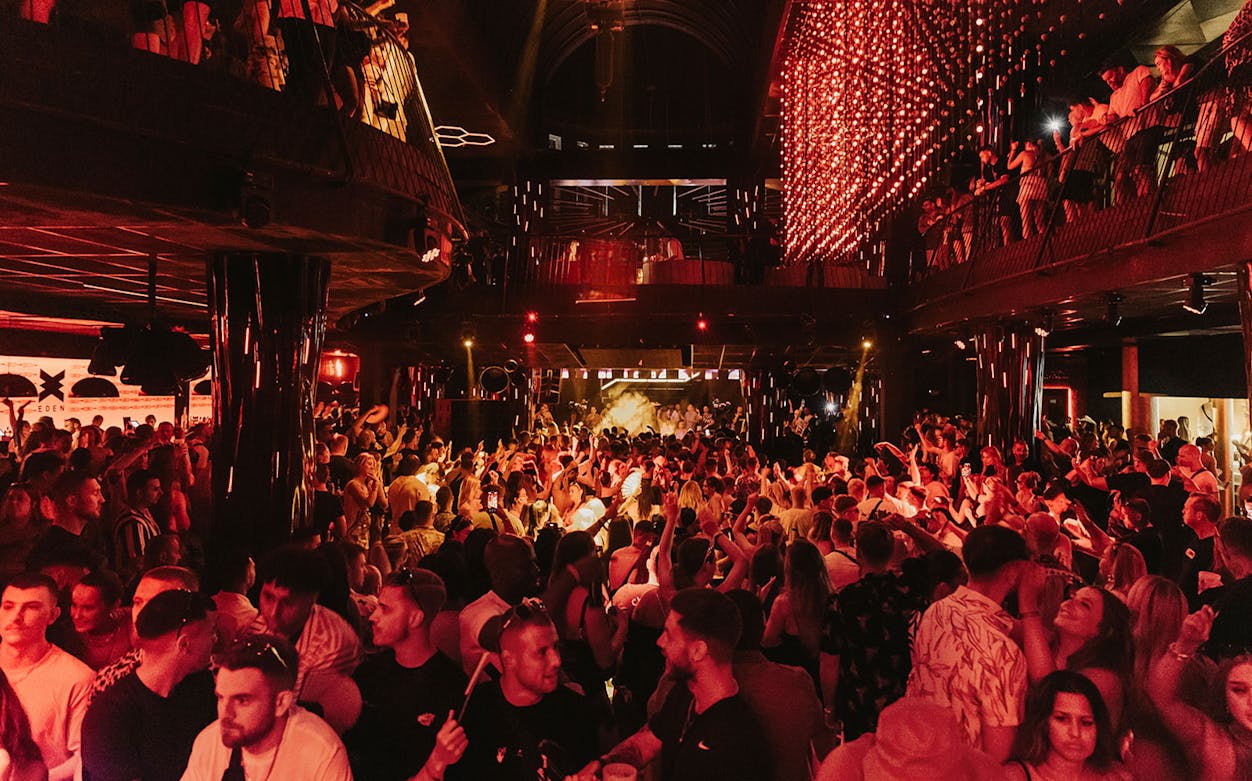 Crowd enjoying a vibrant night at Eden nightclub on a Friday event.