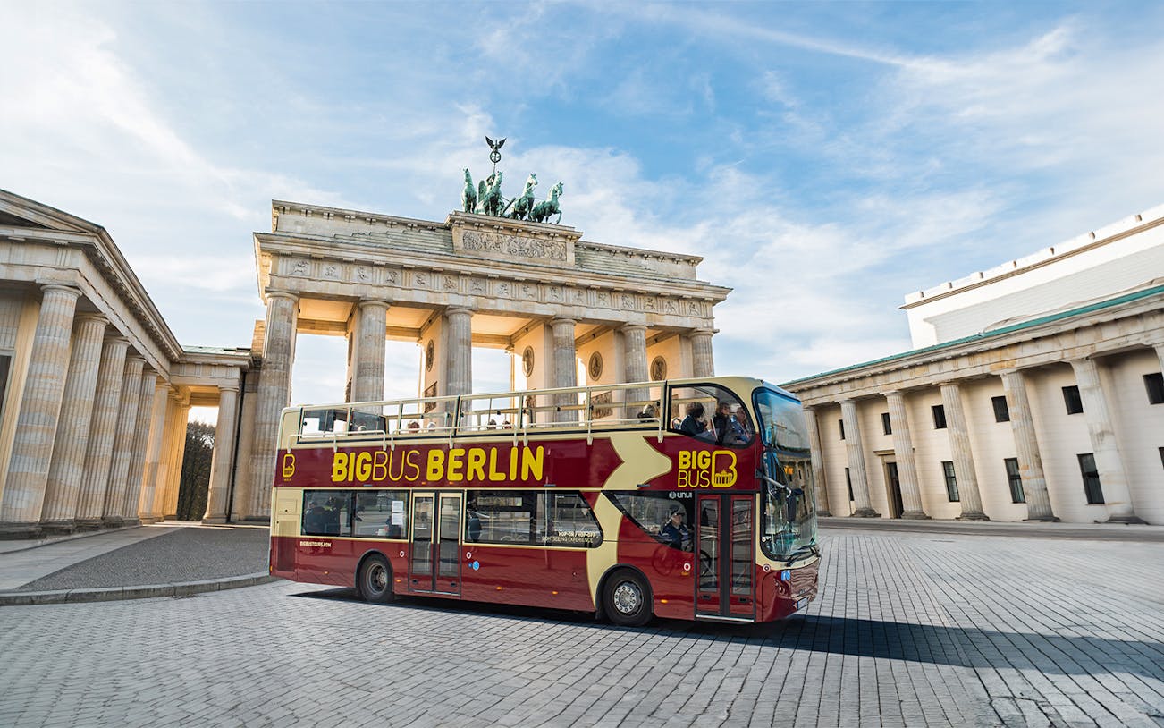 Bigbus Berlin tour bus in front of Brandenburg Gate, Berlin.