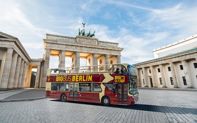 Bigbus Berlin tour bus in front of Brandenburg Gate, Berlin.