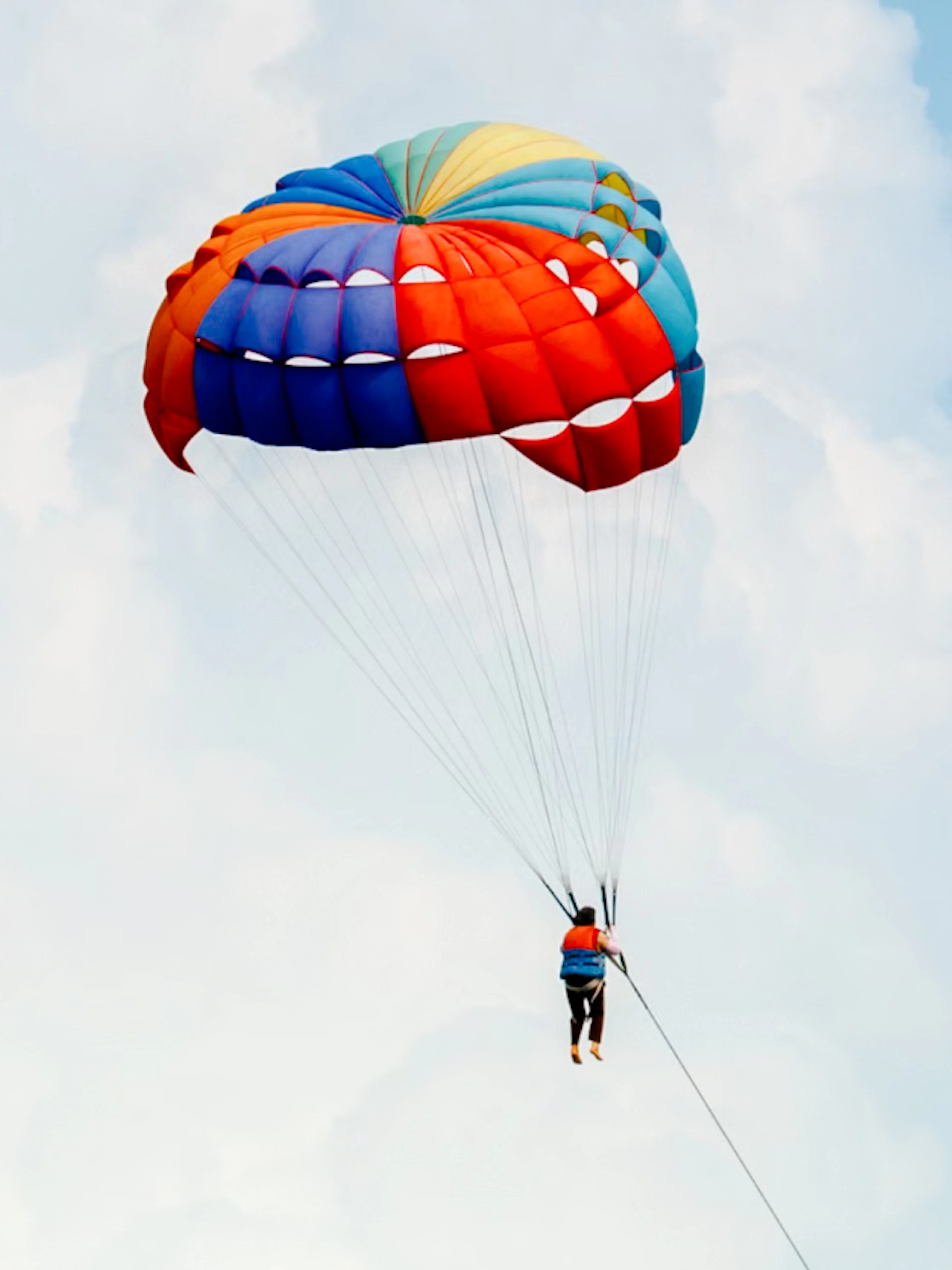 Parasailing adventure during Pattaya to Coral Island tour.