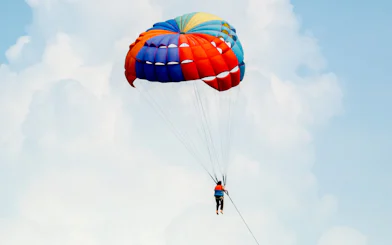 Parasailing adventure during Pattaya to Coral Island tour.